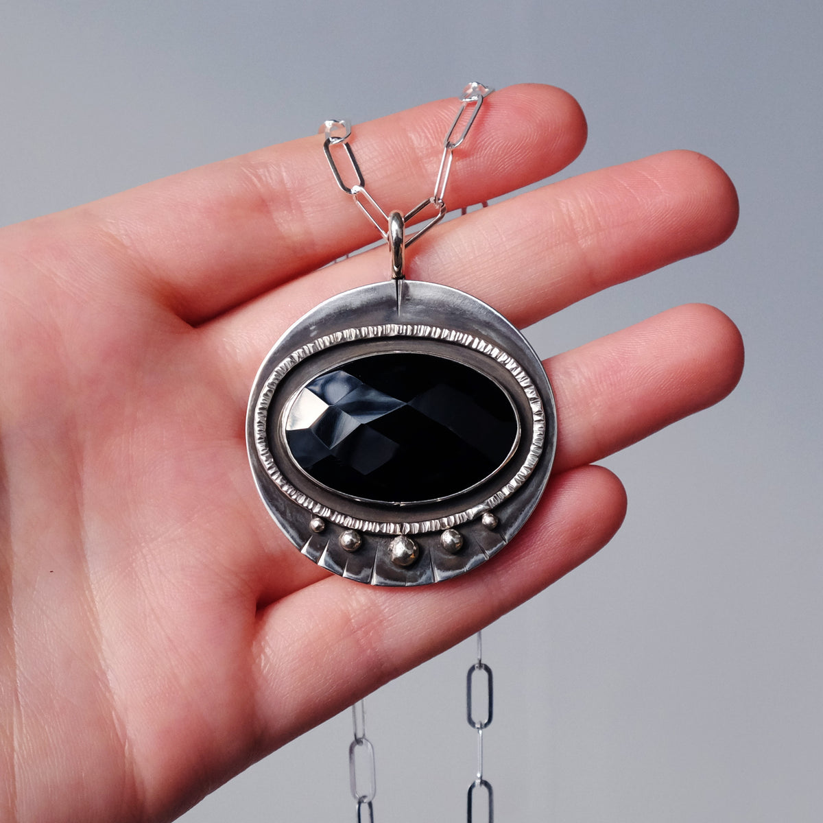 Faceted Onyx Deep Space Pendant