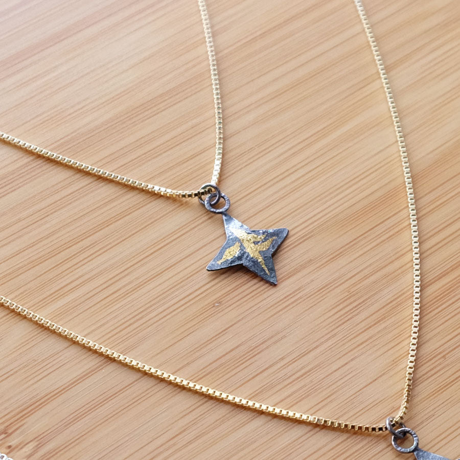 Gold Star Dust Necklace